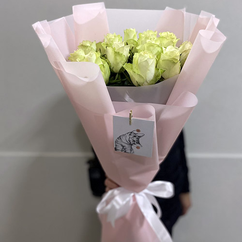 букет з 11 білих троянд в ІФ фото